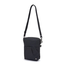 Load image into Gallery viewer, Side view of the Pacsafe Citysafe CX Anti-Theft Convertible Crossbody color Black made with ECONYL® regenerated nylon extended

