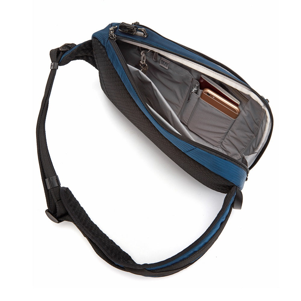 Inside view of the Pacsafe Vibe 325 Anti-Theft Sling Pack color Ocean made with ECONYL® regenerated nylon