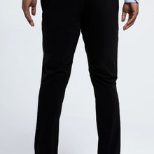 Load image into Gallery viewer, Back view of The Triton Pant State Of Matter color Black made with ECONYL® regenerated nylon
