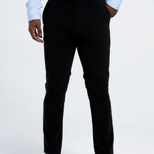 Load image into Gallery viewer, Front view of The Triton Pant State Of Matter color Black made with ECONYL® regenerated nylon

