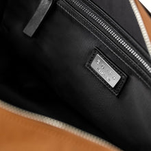 Load image into Gallery viewer, Inside detail of The Gallery Duffel Bag aoife® color Brown and Black made with ECONYL® regenerated nylon

