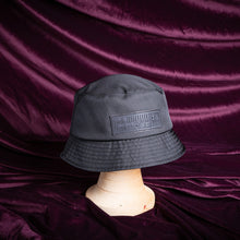 Load image into Gallery viewer, Ecobucky, the waterproof bucket hat by Complit color Black made with ECONYL® regenerated nylon
