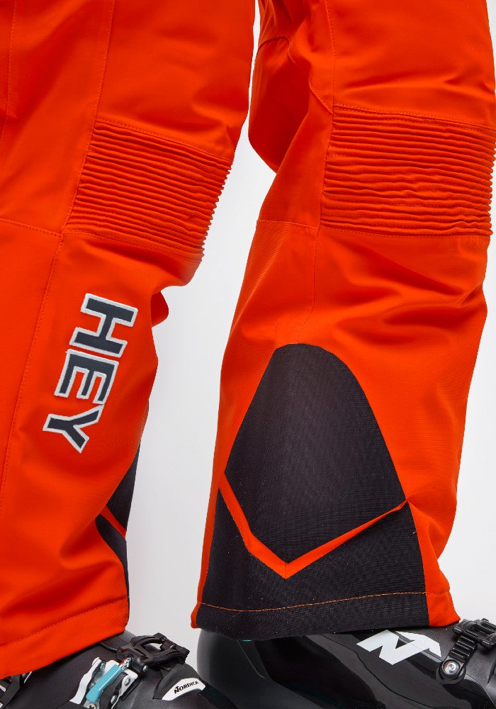 Detail of the Crested Pants Hey Sport color Orange made with ECONYL® regenerated nylon
