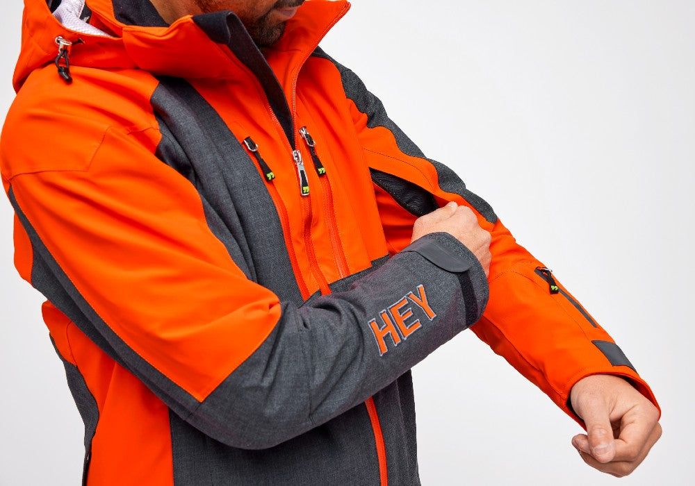 Pocket detail of the Snowbird Wool Jacket Man Hey Sport color Grey and Orange made with ECONYL® regenerated nylon