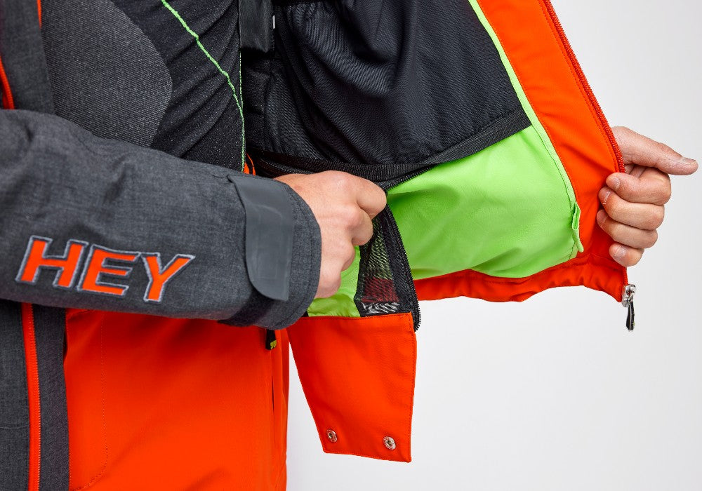 Zipper detail of the Snowbird Wool Jacket Man Hey Sport color Grey and Orange made with ECONYL® regenerated nylon