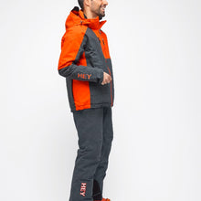 Load image into Gallery viewer, Side view of the Snowbird Wool Jacket Man Hey Sport color Grey and Orange made with ECONYL® regenerated nylon
