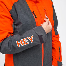 Load image into Gallery viewer, Zipper detail of the Snowbird Wool Jacket Woman Hey Sport color Grey and Orange made with ECONYL® regenerated nylon
