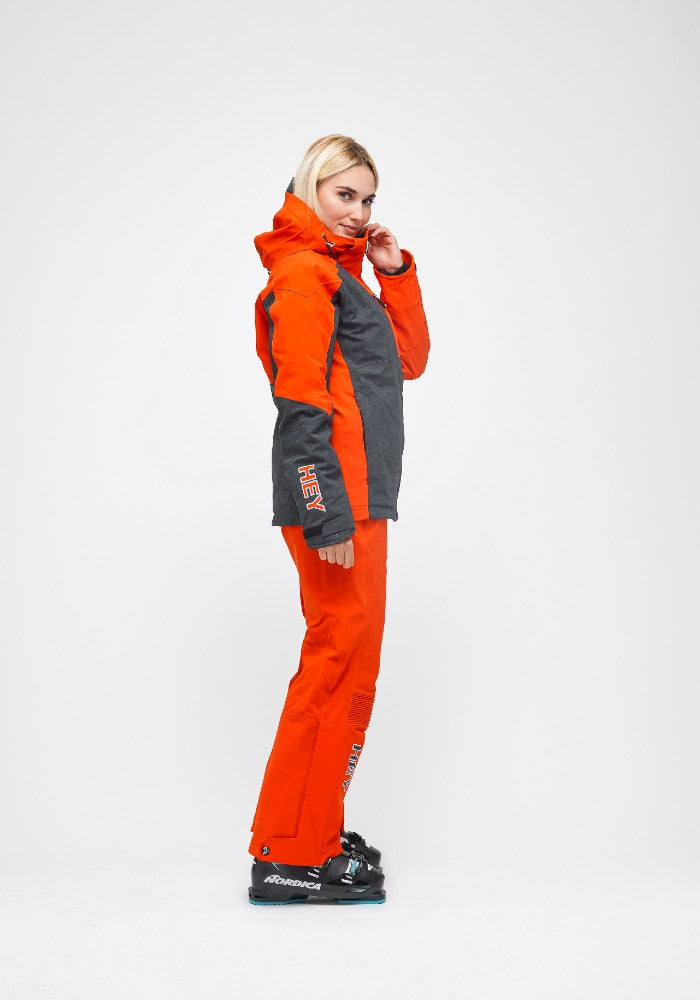 Side view of the Snowbird Wool Jacket Woman Hey Sport color Grey and Orange made with ECONYL® regenerated nylon