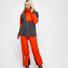 Load image into Gallery viewer, Woman wearing the Snowbird Wool Jacket Woman Hey Sport color Grey and Orange made with ECONYL® regenerated nylon
