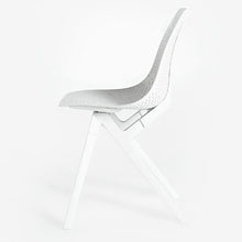 Load image into Gallery viewer, Side view of the noho move™ chair by noho color white made with ECONYL® regenerated nylon
