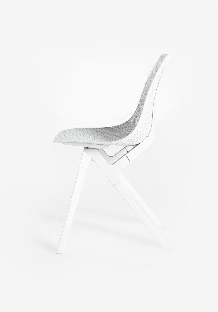 Side view of the noho move™ chair by noho color white made with ECONYL® regenerated nylon