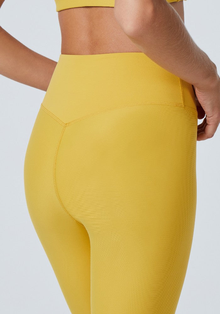 Detail of the Mila Leggings Mustard by Outfyt color Yellow made with ECONYL® regenerated nylon