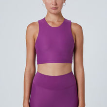 Load image into Gallery viewer, Front view of a woman wearing the Tula Crop Top Plum by Outfyt color Purple made with ECONYL® regenerated nylon
