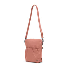 Load image into Gallery viewer, Side view of the Pacsafe Citysafe CX Anti-Theft Convertible Crossbody color Rose made with ECONYL® regenerated nylon extended
