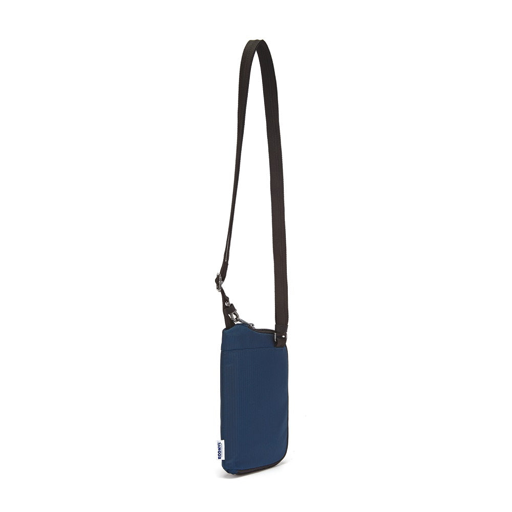Side view of the Pacsafe Daysafe Anti-Theft Tech Crossbody color Ocean made with ECONYL® regenerated nylon