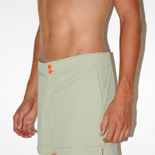 Load image into Gallery viewer, Side view of the Milo Shorts Men&#39;s Swimsuit by Seawild color Green made with ECONYL® regenerated nylon
