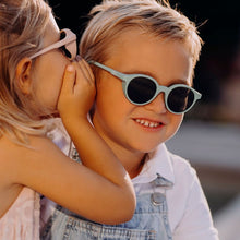 Load image into Gallery viewer, Child wearing SooNice Children Sunnies by SooNice color ice blue made with ECONYL® regenerated nylon
