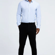 Load image into Gallery viewer, The Triton Pant State Of Matter color Black made with ECONYL® regenerated nylon lifestyle
